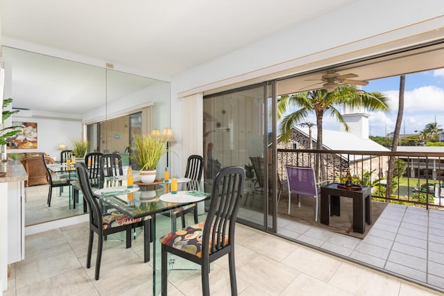 75-5719 Alii Dr Unit 314, Kailua-Kona, HI 96740 - dining space with a ceiling fan and light tile patterned floors