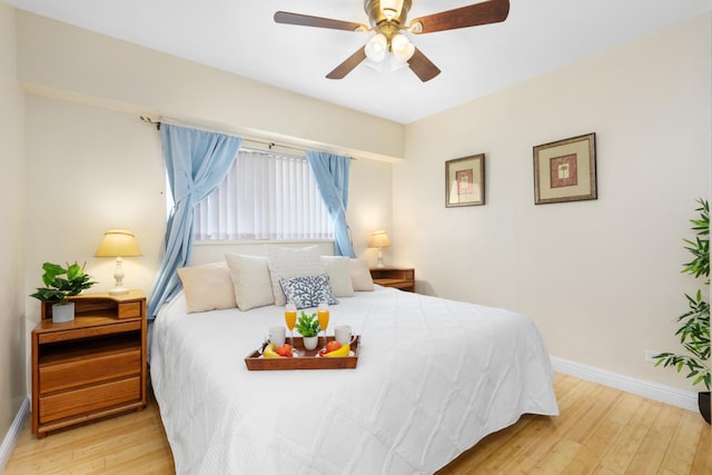 75-5719 Alii Dr Unit 314, Kailua-Kona, HI 96740 - bedroom with wood finished floors and a ceiling fan