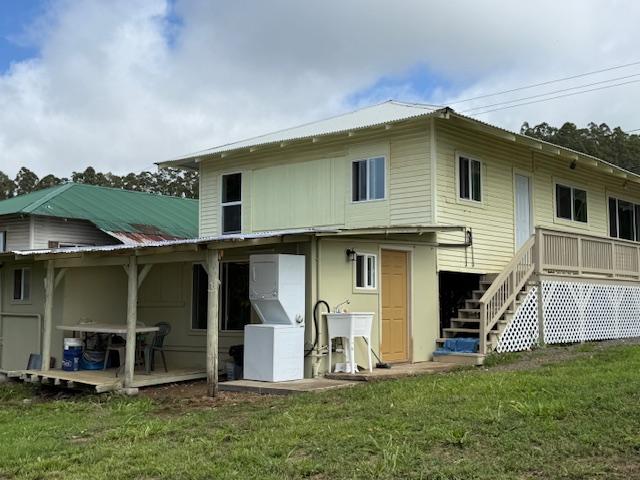 46-4180 Honokaa Waipio Rd, Honokaa, HI 96727 - rear view of property featuring a yard, stairway, and a wooden deck