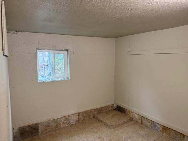 46-4180 Honokaa Waipio Rd, Honokaa, HI 96727 - unfurnished room featuring a textured ceiling and baseboards