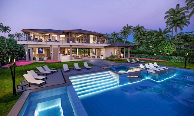 68-1006 Ke Kailani Dr, Kamuela, HI 96743 - back of property at dusk with a balcony, a patio, a pool with connected hot tub, stucco siding, and a metal roof