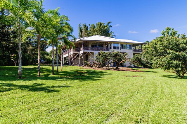 28-238 Akaka Falls Rd, Honomu, HI 96728 - view of front of property featuring stairway and a front lawn