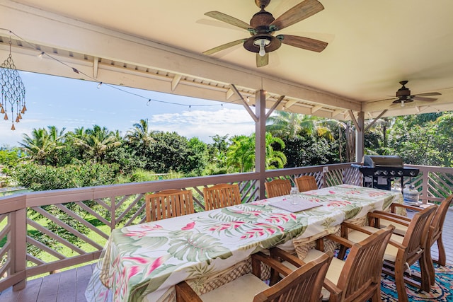 28-238 Akaka Falls Rd, Honomu, HI 96728 - deck with outdoor dining area and a ceiling fan