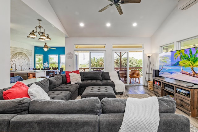 28-238 Akaka Falls Rd, Honomu, HI 96728 - living room with ceiling fan, wood finished floors, a wall mounted air conditioner, recessed lighting, and high vaulted ceiling