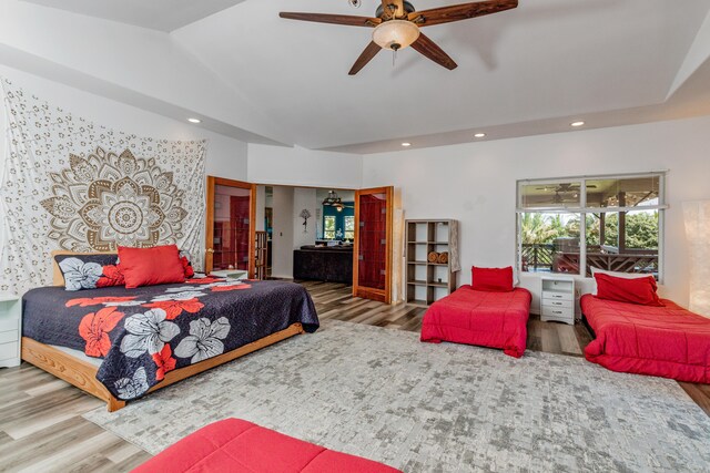 28-238 Akaka Falls Rd, Honomu, HI 96728 - bedroom with wood finished floors, vaulted ceiling, recessed lighting, and a ceiling fan