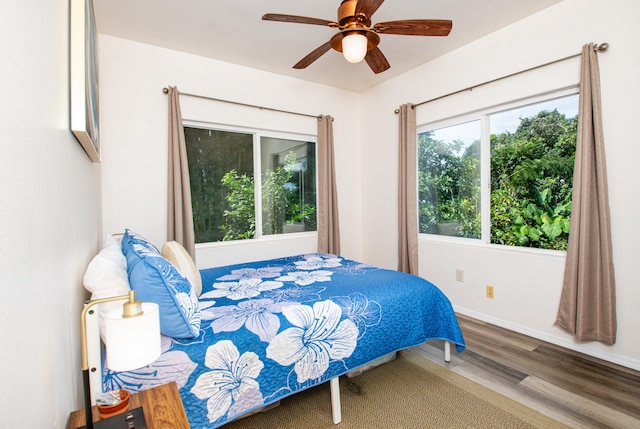 28-238 Akaka Falls Rd, Honomu, HI 96728 - bedroom featuring wood finished floors and ceiling fan