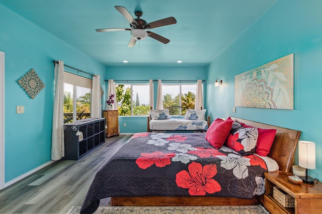 28-238 Akaka Falls Rd, Honomu, HI 96728 - bedroom featuring multiple windows, wood finished floors, a ceiling fan, and recessed lighting
