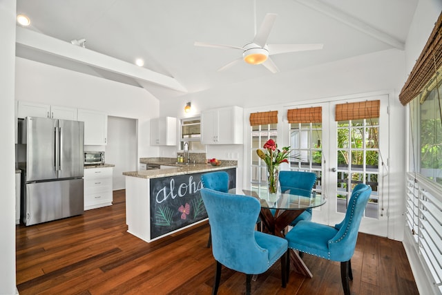 3795 Kelii Pl, Princeville, HI 96722 - dining space with vaulted ceiling, dark wood-type flooring, ceiling fan, and french doors