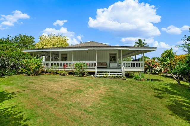3795 Kelii Pl, Princeville, HI 96722 - back of property featuring a yard