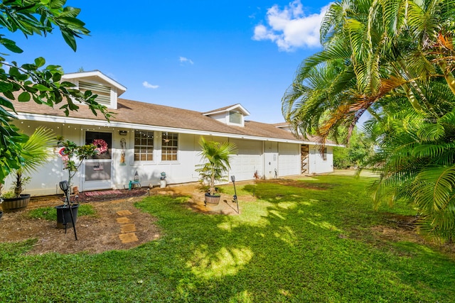 6201-B Kawaiihau Rd Unit B, Kapaa, HI 96746 - single story home with a front yard, a shingled roof, and a garage