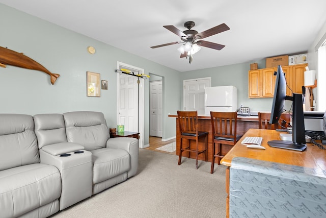 55-548 Hawi Rd, Hawi, HI 96719 - living area featuring a ceiling fan, a desk, and light colored carpet
