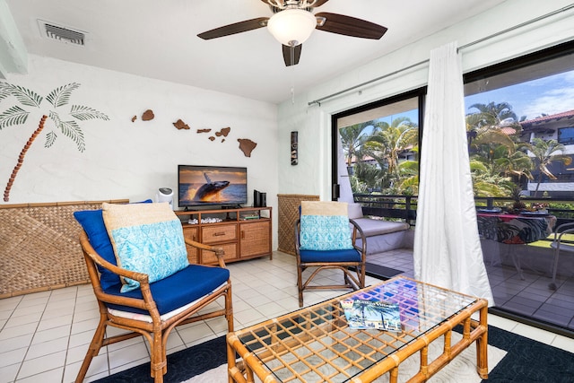 75-6082 Alii Dr Unit A207, Kailua-Kona, HI 96740 - living room featuring a ceiling fan and tile patterned floors