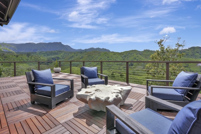 6003-B Halaulani Pl Unit 2, Kilauea, HI 96754 - wooden terrace with a mountain view, an outdoor hangout area, and a view of trees