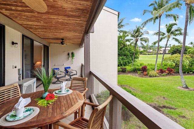 78-6800 Alii Dr Unit 7202, Kailua-Kona, HI 96740 - balcony with a ceiling fan, outdoor dining space, and view of golf course