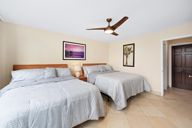 78-6800 Alii Dr Unit 7202, Kailua-Kona, HI 96740 - bedroom with a ceiling fan and light tile patterned floors