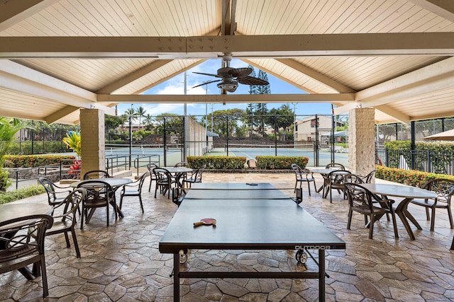 78-6800 Alii Dr Unit 7202, Kailua-Kona, HI 96740 - view of patio / terrace with a tennis court, a gazebo, a ceiling fan, and outdoor dining space