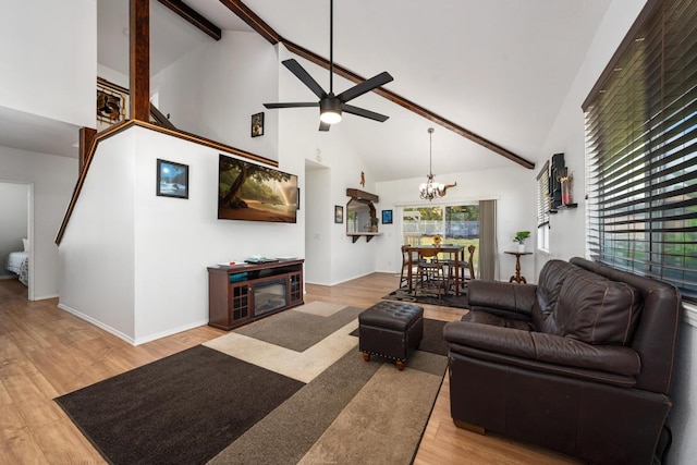 68-1760 Nawili Pl, Waikoloa, HI 96738 - living area with high vaulted ceiling, a ceiling fan, a chandelier, light wood-style flooring, and beam ceiling