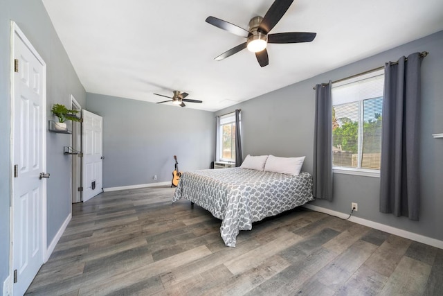 68-1760 Nawili Pl, Waikoloa, HI 96738 - bedroom with dark wood-type flooring and a ceiling fan