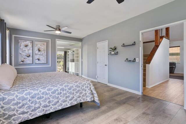 68-1760 Nawili Pl, Waikoloa, HI 96738 - bedroom with wood finished floors and a ceiling fan