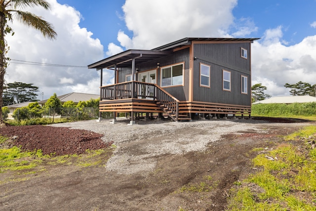 16-2078 Mauna Kea Dr, Pahoa, HI 96778 - view of front facade with a wooden deck