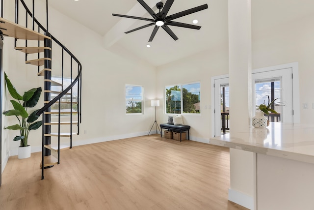 16-2078 Mauna Kea Dr, Pahoa, HI 96778 - unfurnished living room featuring light wood-style floors, high vaulted ceiling, stairs, ceiling fan, and recessed lighting