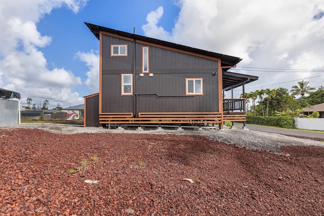 16-2078 Mauna Kea Dr, Pahoa, HI 96778 - rear view of house with a deck