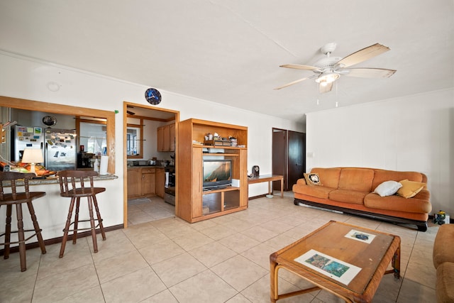7786 Ulili Rd, Kekaha, HI 96752 - living area with ceiling fan, light tile patterned floors, and crown molding