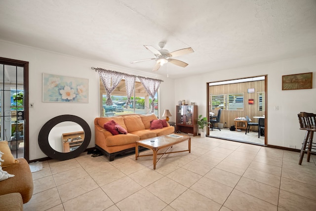 7786 Ulili Rd, Kekaha, HI 96752 - living room with ceiling fan, plenty of natural light, and light tile patterned flooring