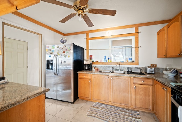 7786 Ulili Rd, Kekaha, HI 96752 - kitchen featuring stainless steel refrigerator with ice dispenser, a ceiling fan, light tile patterned flooring, range, and brown cabinetry