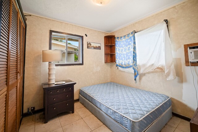 7786 Ulili Rd, Kekaha, HI 96752 - bedroom with a closet and light tile patterned floors