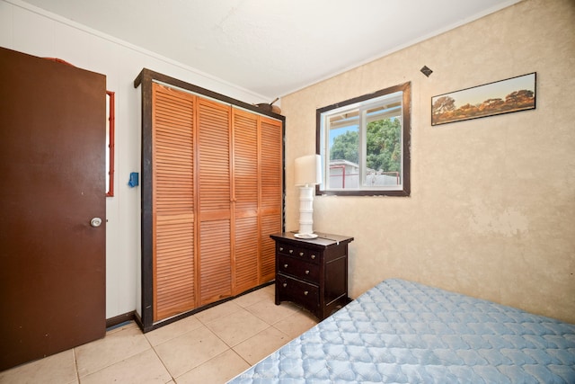7786 Ulili Rd, Kekaha, HI 96752 - bedroom with light tile patterned floors and ornamental molding