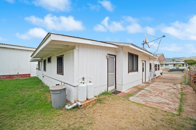 7786 Ulili Rd, Kekaha, HI 96752 - view of home's exterior with a gate