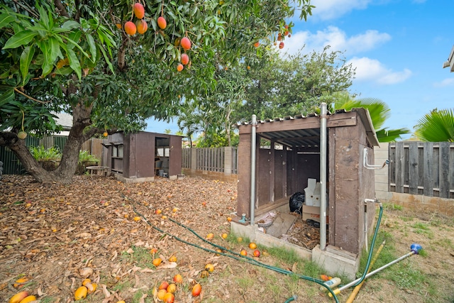 7786 Ulili Rd, Kekaha, HI 96752 - fenced backyard with an outdoor structure and exterior structure