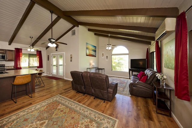 15-2736 Ahi St, Pahoa, HI 96778 - living area featuring wood ceiling, a wall unit AC, wood finished floors, and a ceiling fan