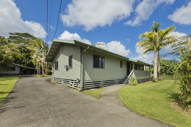 15-2736 Ahi St, Pahoa, HI 96778 - view of side of property with a lawn