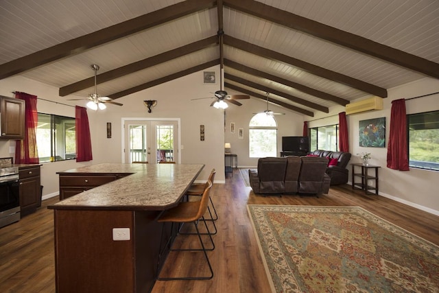 15-2736 Ahi St, Pahoa, HI 96778 - kitchen featuring a ceiling fan, open floor plan, a breakfast bar, french doors, and wooden ceiling