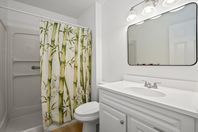 3-3400 Kuhio Hwy Unit B101, Lihue, HI 96766 - full bath featuring vanity, curtained shower, and wood finished floors