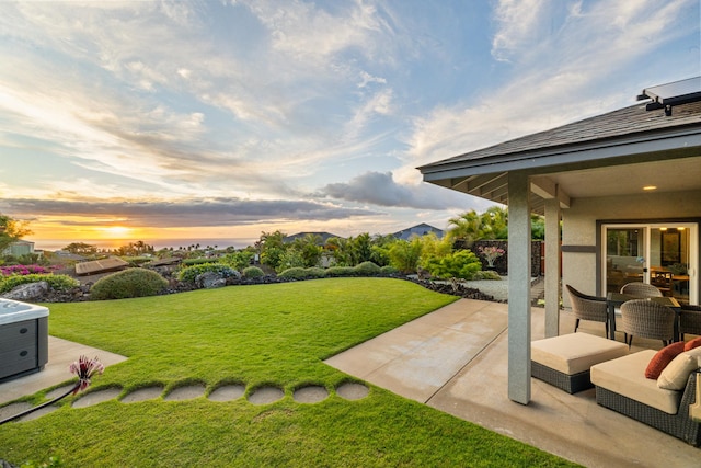 68-2182 Laakea Way, Waikoloa, HI 96738 - yard at dusk featuring a patio and a yard