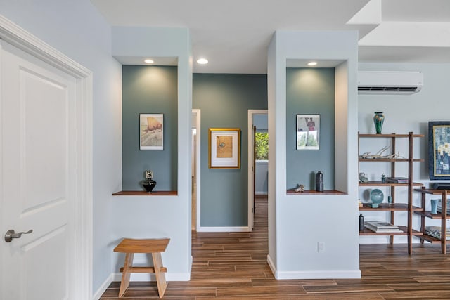 68-2182 Laakea Way, Waikoloa, HI 96738 - hall featuring an AC wall unit, wood finished floors, and recessed lighting