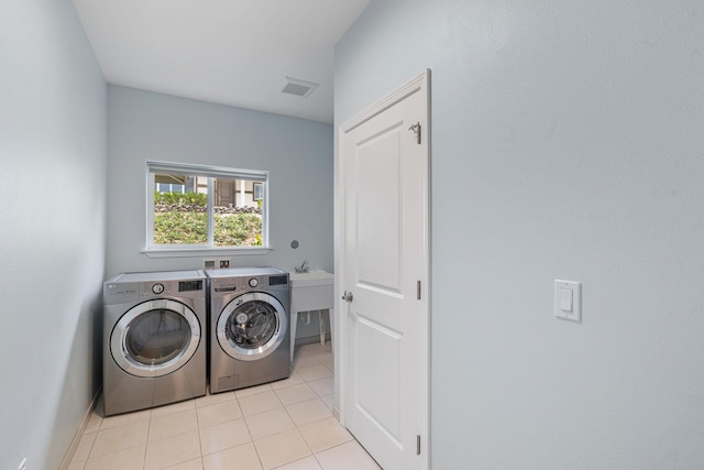 68-2182 Laakea Way, Waikoloa, HI 96738 - laundry area featuring independent washer and dryer and light tile patterned flooring