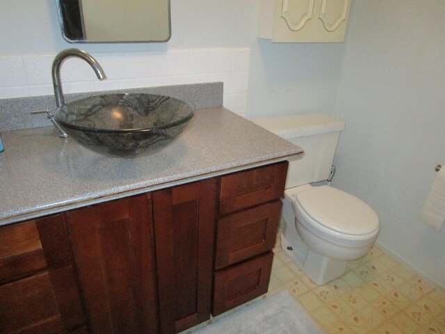 478 Hilinai St, Hilo, HI 96720 - bathroom with vanity, tile patterned floors, and backsplash