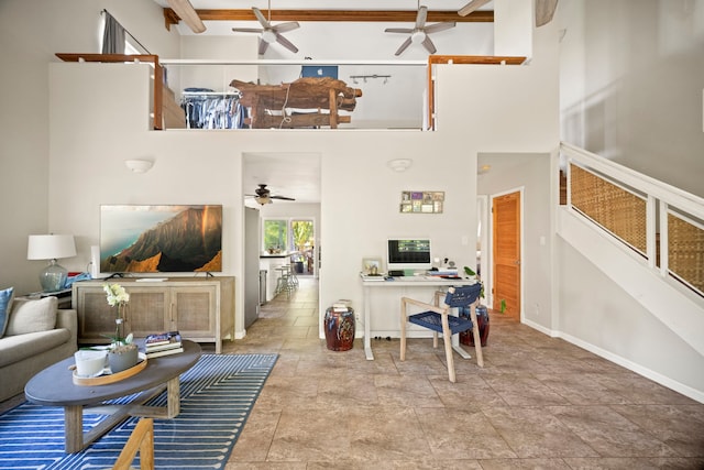 2375 Kipuka St, Koloa, HI 96756 - living room featuring ceiling fan, a towering ceiling, an office area, and stone finish floors