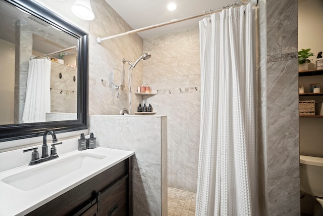 2375 Kipuka St, Koloa, HI 96756 - bathroom featuring a tile shower and vanity