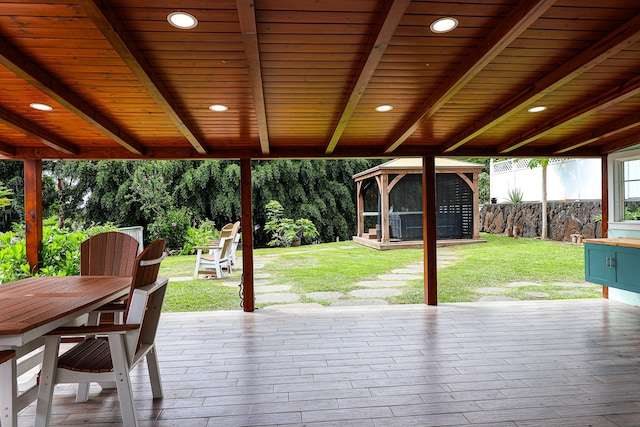 76-206 Kealoha St Unit 2A, Kailua-Kona, HI 96740 - wooden terrace with a gazebo, a lawn, and outdoor dining space