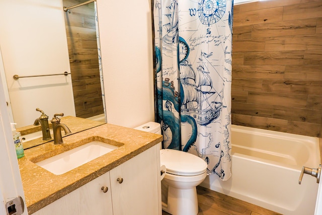 76-206 Kealoha St Unit 2A, Kailua-Kona, HI 96740 - full bath featuring vanity, shower / bathtub combination with curtain, and wood finished floors