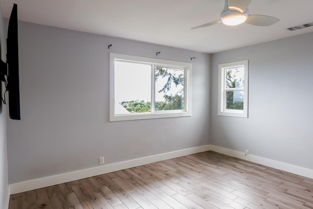 76-206 Kealoha St Unit 2A, Kailua-Kona, HI 96740 - unfurnished room with light wood-style flooring and a ceiling fan