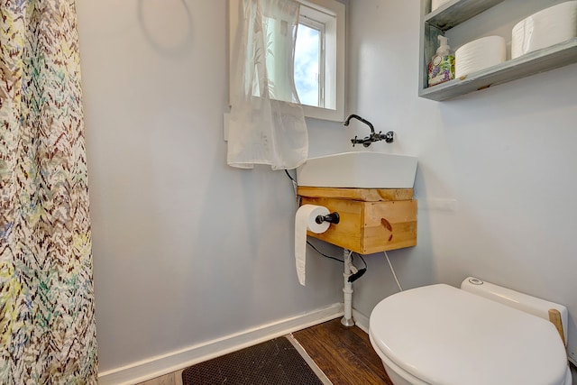 1 Piilani Rd, Pahoa, HI 96778 - bathroom with toilet and wood finished floors