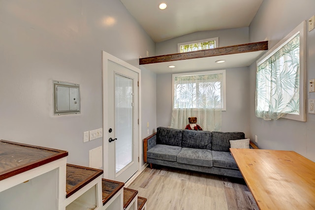 1 Piilani Rd, Pahoa, HI 96778 - living room featuring vaulted ceiling, light wood finished floors, and recessed lighting