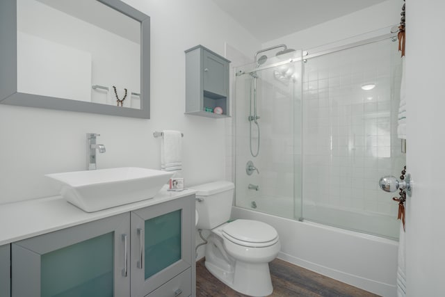 68-3932 Ehu Kai Loop Unit 3403, Waikoloa, HI 96738 - bathroom featuring wood finished floors, vanity, and bath / shower combo with glass door