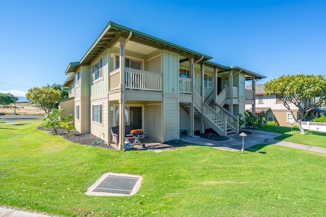 68-3932 Ehu Kai Loop Unit 3403, Waikoloa, HI 96738 - view of building exterior featuring stairway